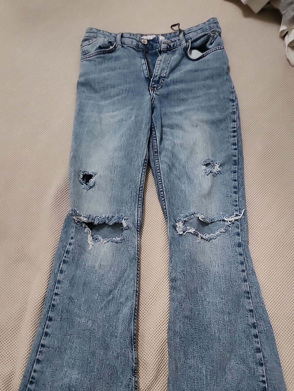 Women's Light Blue Distressed Jeans